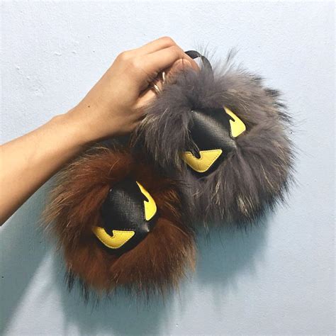 fendi grey fur ball|Bags .